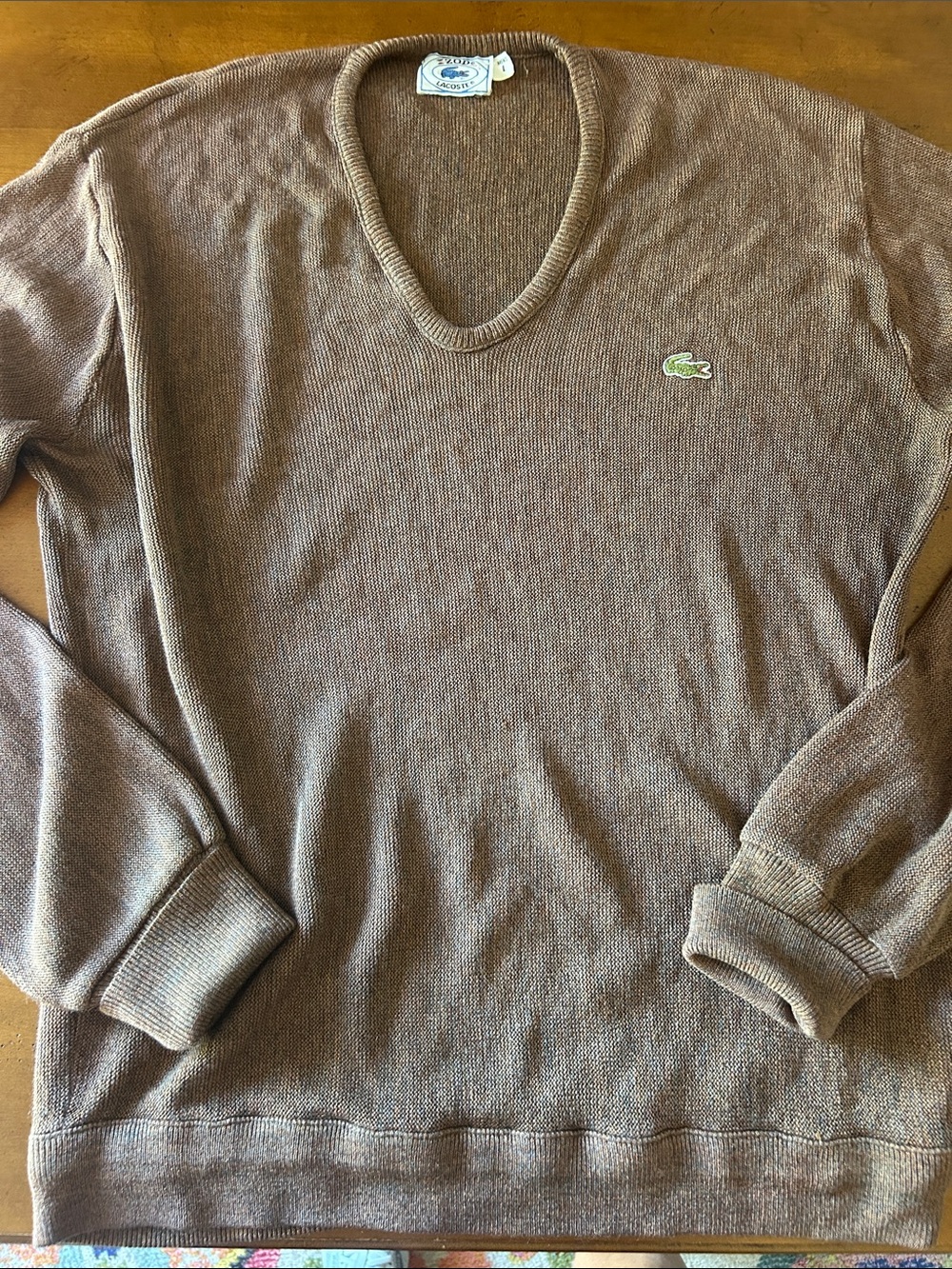 Vintage 1970s Izod Lacoste V-neck knit sweater with a green crocodile logo